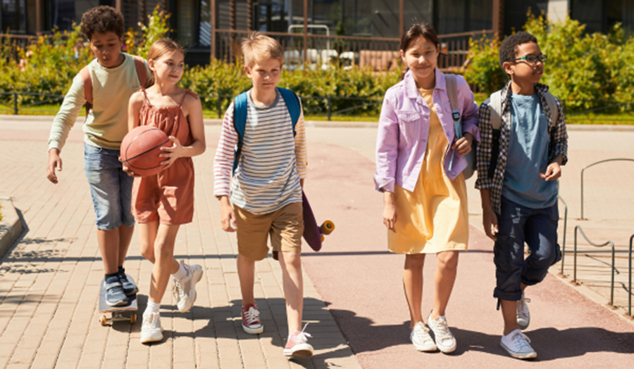 Children walking or skateboarding to school